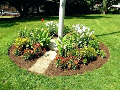 Why you need solar flagpole lights. Landscape Around Flagpole Landscape Edging Ideas Concrete ...