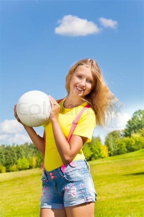 See more ideas about 13 year olds, cute crop tops, instagram 2017. Cute and happy 13 years old girl with long blond hair standing in the grass with the ball in the ...