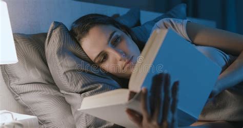 Woman Lying In Bed And Reading A Book Stock Image Image Of Intelligent Lifestyle 235846307