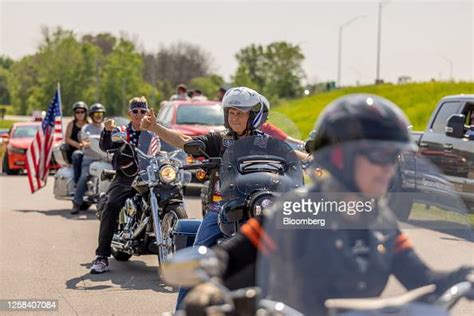 Former Vice President Mike Pence Center Rides A Motorcycle During