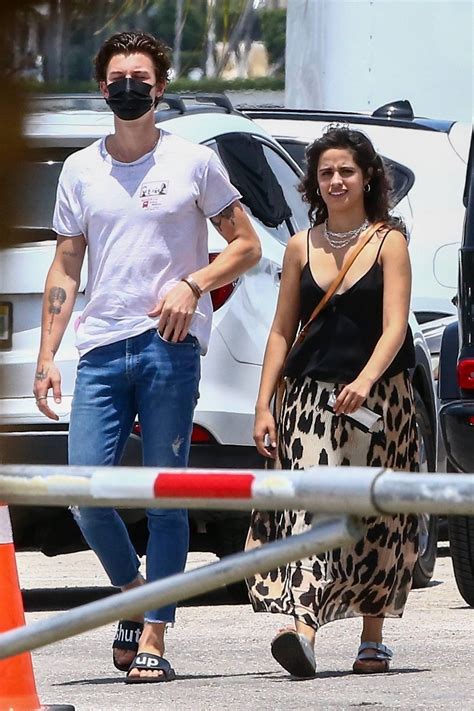 Shawn mendes and camila cabello proved there's definitely more than friendship between them when they were spotted kissing while taking a dip in a pool in miami beach on july 29. Camila Cabello - Out in Miami-02 | GotCeleb