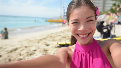 Beach Bikini Girl Taking Selfie With Smartphone Smiling Happy Blowing A Kiss Mixed Race Asian