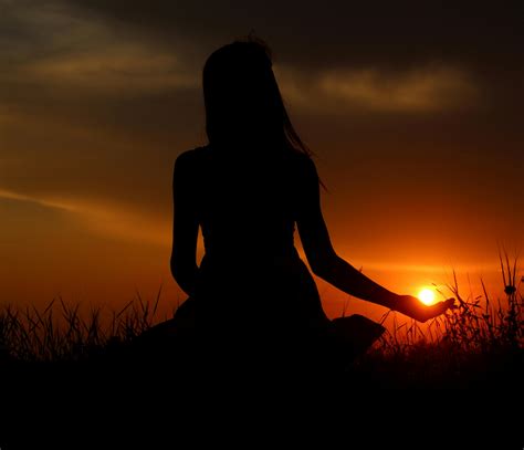 Silhouette Of Woman Sitting On Dock During Sunset · Free Stock Photo