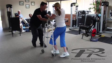 Stacy Quadriplegic Walking Pedaling An Exercise Bike And Using Her