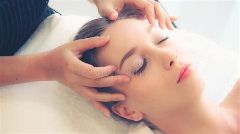 Woman Gets Facial And Head Massage In Luxury Spa Stock Image Image Of Healthy Portrait