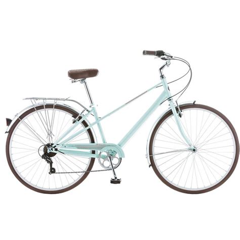 A Blue Bicycle Is Shown Against A White Background And Has Brown Rims