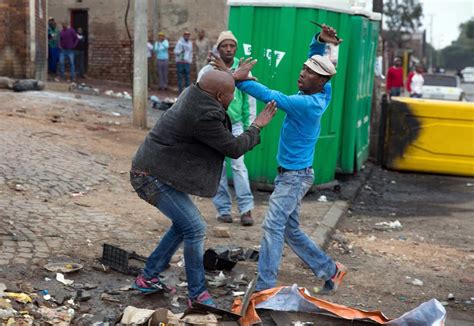 The Story Behind The Photo Of A Brutal Killing In South Africa Time