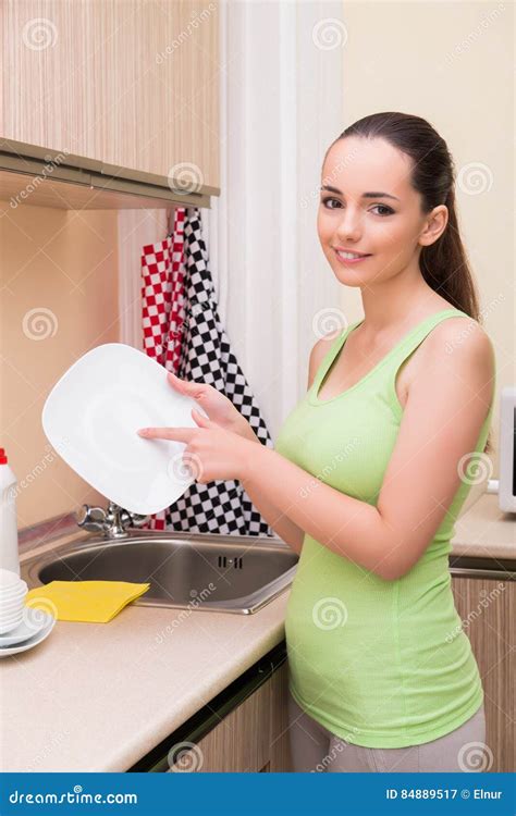 The Young Wife Woman Washing Dishes In Kitchen Stock Image Image Of Dishes Hygiene 84889517