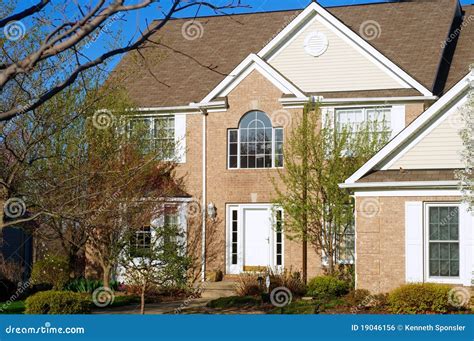 Elegant Red Brick Middle Class Suburban Home Royalty Free Stock Photo