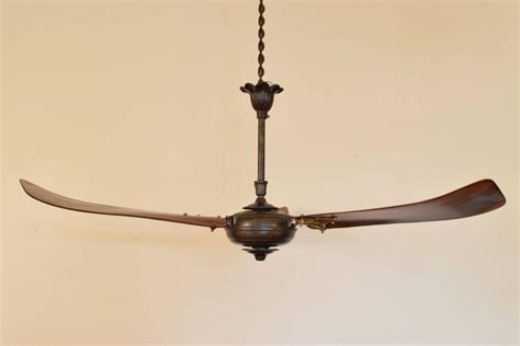 Pin by simply best of on best ceiling fans with lights, wrought iron ceiling fan with light fans photo hunter italian countryside 52 in indoor cocoa bronze. Italian Iron and Wooden Three-Blade Ceiling Fan, circa ...