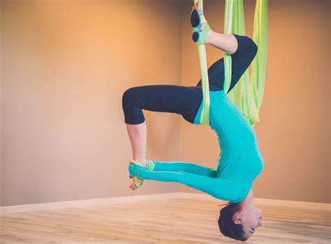 what to expect in your first aerial yoga class fitness hq aerial yoga aerial silks aerial