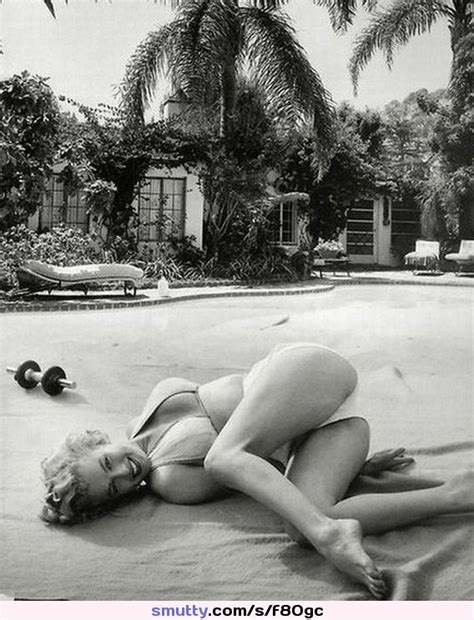 marilyn monroe in a surprisingly provocative swimsuit pose