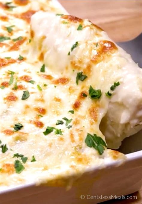 In a separate bowl microwave or otherwise melt butter and crush crackers into it, stirring to coat. Sour Cream Chicken Enchiladas - CentsLess Deals