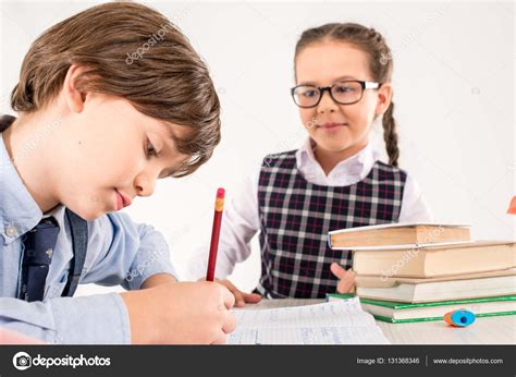Schoolgirl Looking At Classmate — Stock Photo © Alexnosenko 131368346