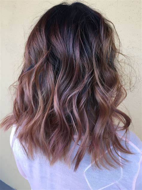This pastel pink has been meticulously streaked through the black hair to create a beautiful ombre balayage. Dusty rose gold balayage on @d.lushus by Allison Gregg at ...