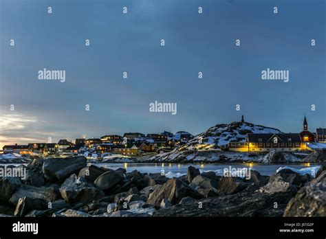 Nuuk City Old Harbor Sunset View With Stones And Icebergs Greenland