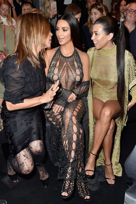 Kim And Kourtney Kardashian At Balmain Fashion Show At