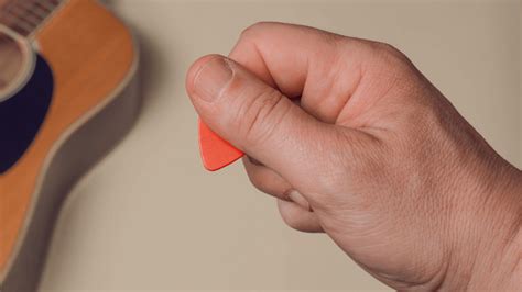 How To Hold A Guitar Pick Correctly A Step By Step Guide Dead Guitars