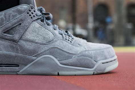 Monochromatic Appeal On The Kaws X Air Jordan 4 •