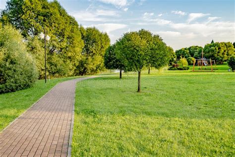 Walking Path In The Summer Park On A Clear Sunny Day Stock Photo