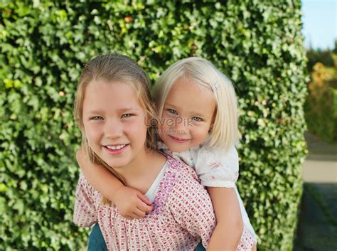 Girl Carried By Sister Picture And Hd Photos Free Download On Lovepik
