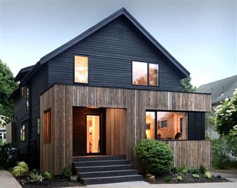 Houses With Black Cladding That Are In Harmony With Their Surroundings