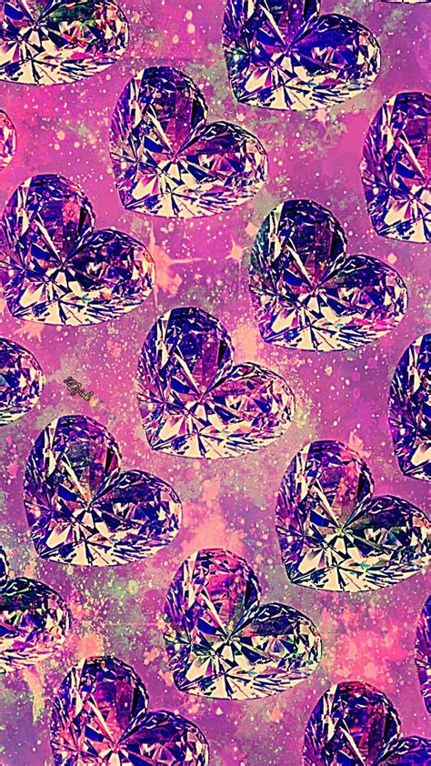 Many Different Colored Diamonds On A Pink Background