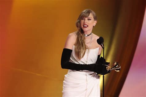 Grammys 2024 Taylor Swift Makes History With Fourth Album Of Year Win Reuters