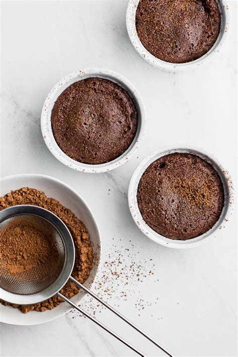 Let the chocolate cool for a couple of minutes, then add in the powdered sugar, whole eggs and yolks and mix. Keto Lava Cakes with Peanut Butter | Peanut Butter Plus ...