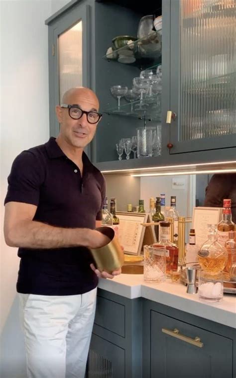 stanley tucci demonstrates how to make an old fashioned drink making an old fashioned old