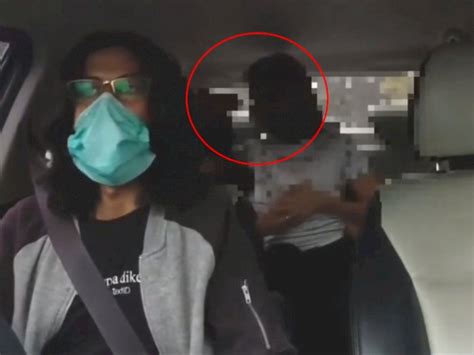 Viral Video Sejoli Penumpang Mesum Dalam Taksi Online Kepergok Cium