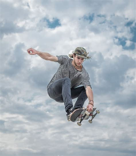 Free Download Hd Wallpaper Jump Man Doing Tricks On Skateboard