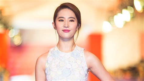watch access hollywood interview disney casts liu yifei as mulan in live action remake