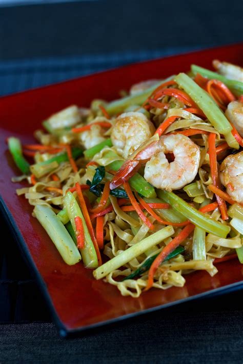 This sichuan noodles dish combines chicken, shrimp, and a spicy sauce made with hot chili oil. Fried Noodles with Garlic Shrimp - Steamy Kitchen Recipes