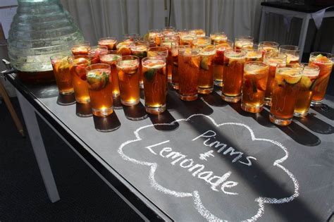 A Table Topped With Lots Of Glasses Filled With Different Types Of