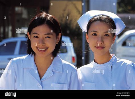 Two Asian Nurses Together Telegraph
