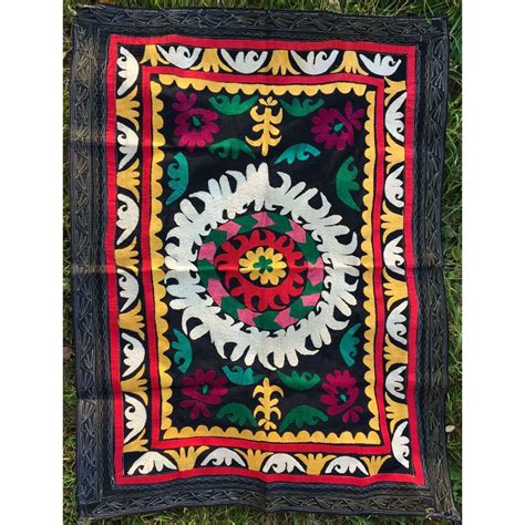 Vintage small Suzani ethnic textile, tajik silk embroidery on cotton.