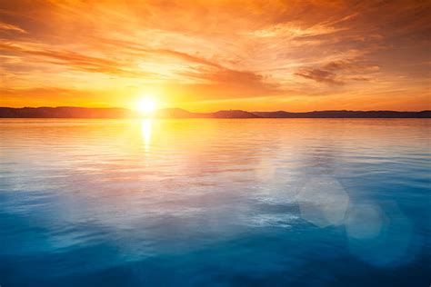 Best Sunrise Over Water Stock Photos Pictures And Royalty Free Images