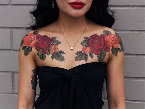 Girls prefer tattoos that enhance their personality, beauty and femininity. flower tattoo | Red flower tattoos, Chest tattoos for women, Chest piece tattoos