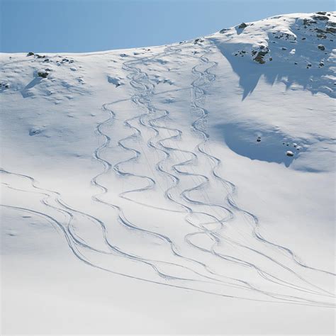 Ski Tracks In The Snow On A Mountain Photograph By Keith Levit Fine