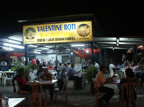 While you're there, you should also try their signature side dishes—fried you best believe it's that good as there are long queues every morning; Valentine Roti | Restaurants in KL City Centre, Kuala Lumpur