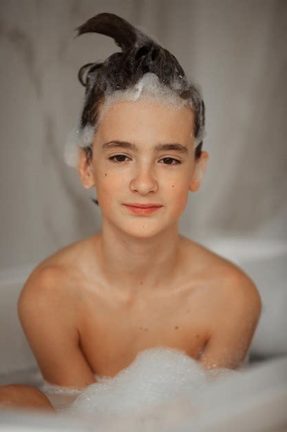 Premium Photo Teenager Takes A Bubble Bath