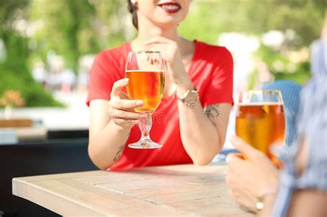 Young Women With Glasses Of Beer At Table Stock Image Image Of Glasses Lager 118742029
