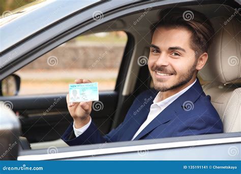 Young Man Holding Driving License Stock Image Image Of Card Road
