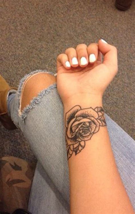50 Beautiful Rose Tattoo Ideas Rose Tattoos On Wrist Wrist Tattoos For Women Hand Tattoos