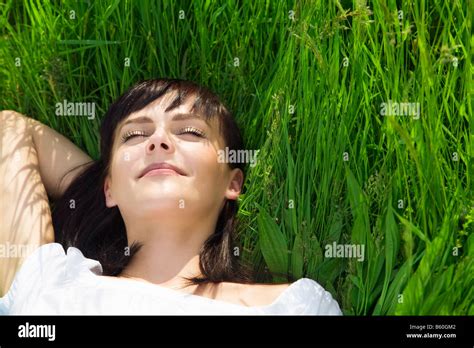Beautiful Girl Lying Down Of Grass Copy Space Stock Photo Alamy