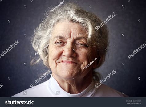 Happy Granny Portrait On Dark Background Stock Photo 358976084