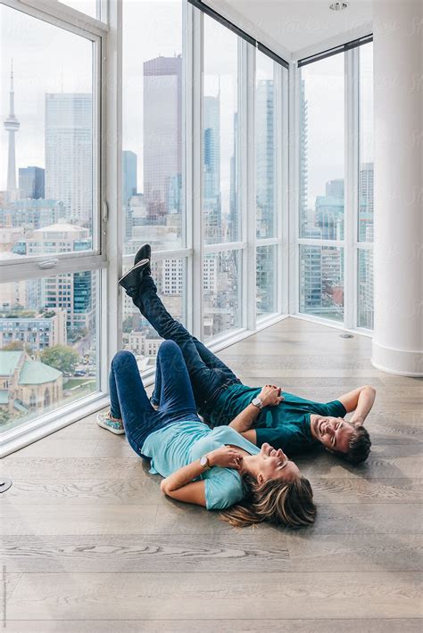 Real Estate Young Couple In Their New Condo By Stocksy Contributor Jen Grantham Stocksy
