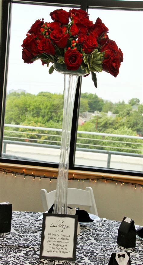 Tall Glass Vase Wedding Centerpiece With Red Roses And Greenery Glass