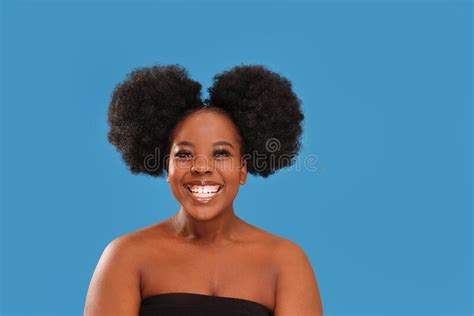 Young Happy Afro Woman Looking And Smiling To The Camera Real People